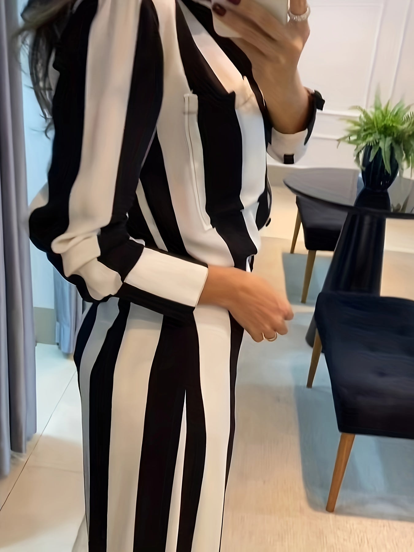 A Two-Piece Set Featuring a Stylish Black And White Striped Shirt with Button Pocket Design And Wide-Leg Pants for Autumn Leisure.